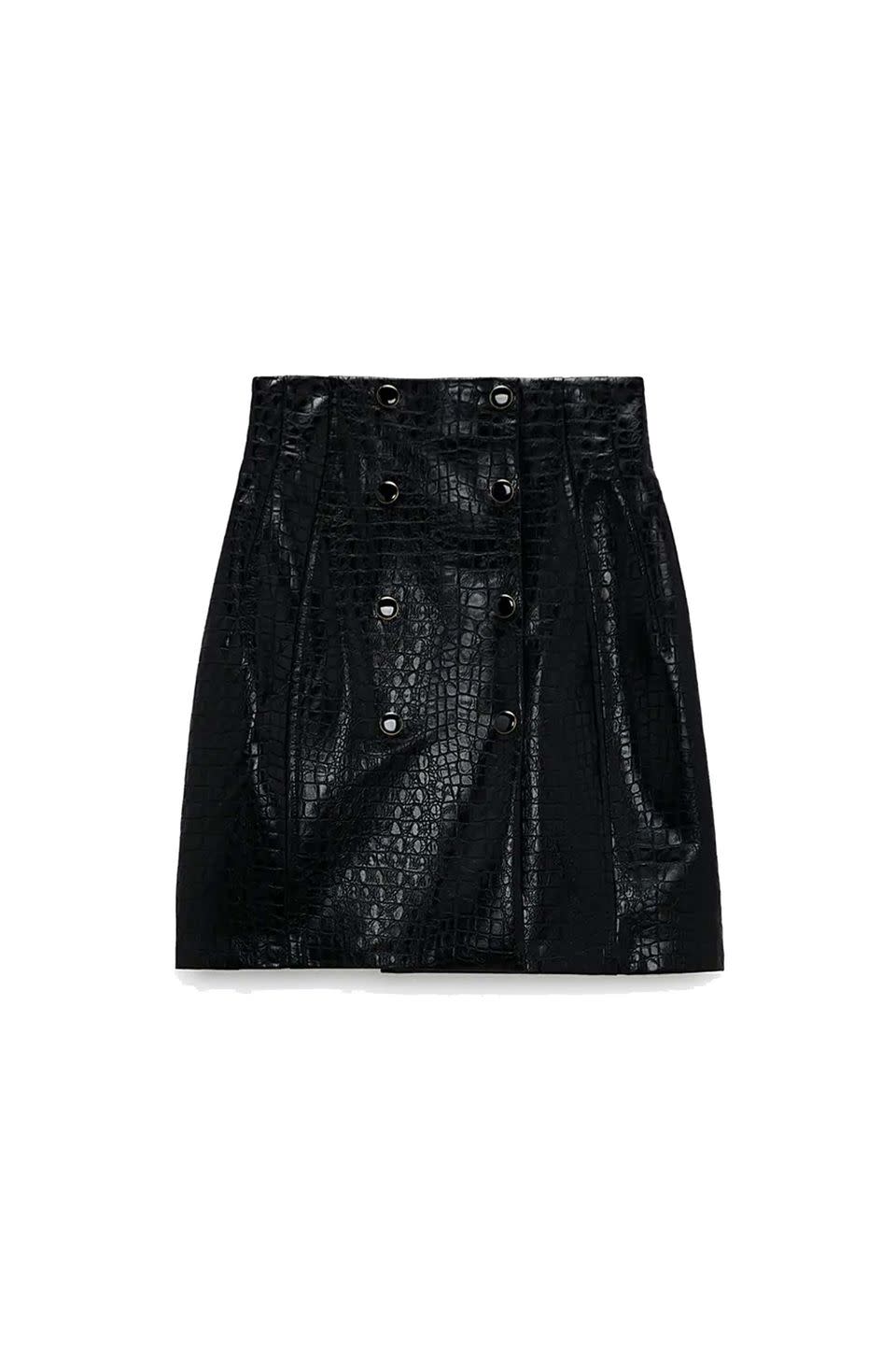 <p><a class="link " href="https://www.zara.com/uk/en/faux-leather-mini-skirt-p07901223.html?v1=58903575" rel="nofollow noopener" target="_blank" data-ylk="slk:SHOP NOW;elm:context_link;itc:0;sec:content-canvas">SHOP NOW</a></p><p>Team this Zara mini with thick black tights and block-heeled booties for a fun look that will work on any occasion.</p><p>Skirt, £25.99, <a href="https://www.zara.com/uk/en/faux-leather-mini-skirt-p07901223.html?v1=58903575" rel="nofollow noopener" target="_blank" data-ylk="slk:Zara;elm:context_link;itc:0;sec:content-canvas" class="link ">Zara</a></p>