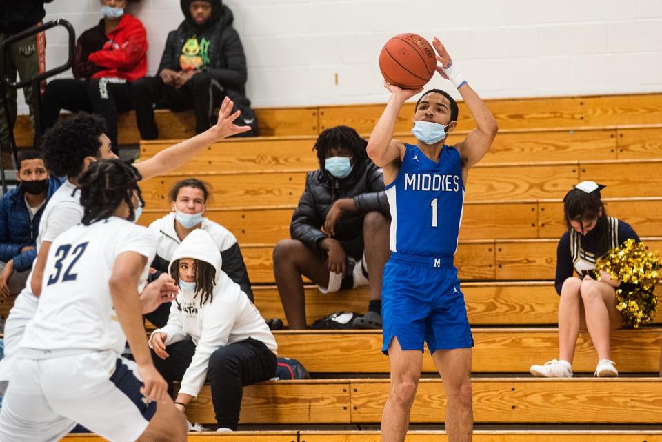 Middletown's Chris Cruz puts up a jumper.