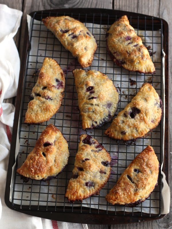 <strong>Get the <a href="http://www.completelydelicious.com/2013/07/blueberry-hand-pies.html" target="_blank">Blueberry Hand Pies recipe</a> from Completely Delicious</strong>