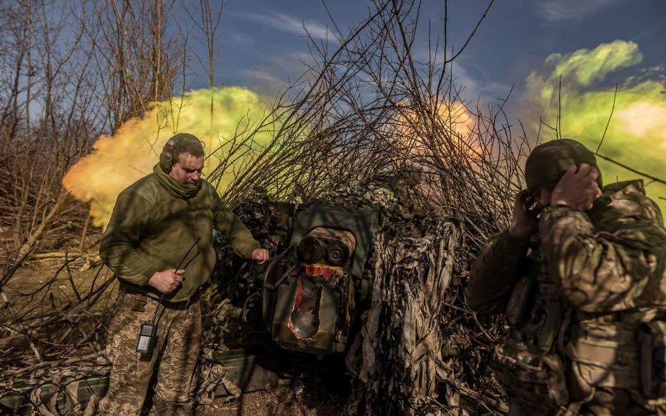 Ukrainian soldiers fire D-30 artillery as the Russia-Ukraine war continues in the direction of Bakhmut