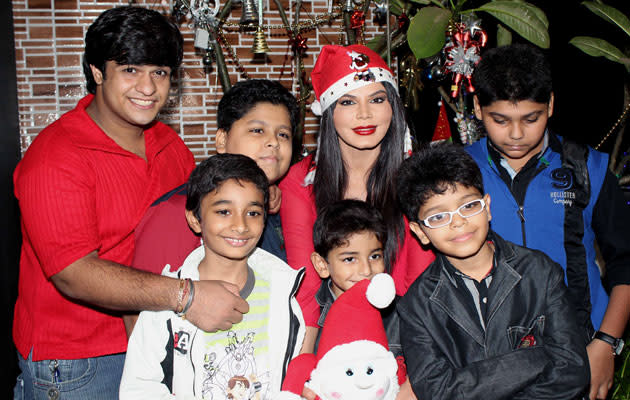 Rakhi strikes a pose with the kids during Christmas