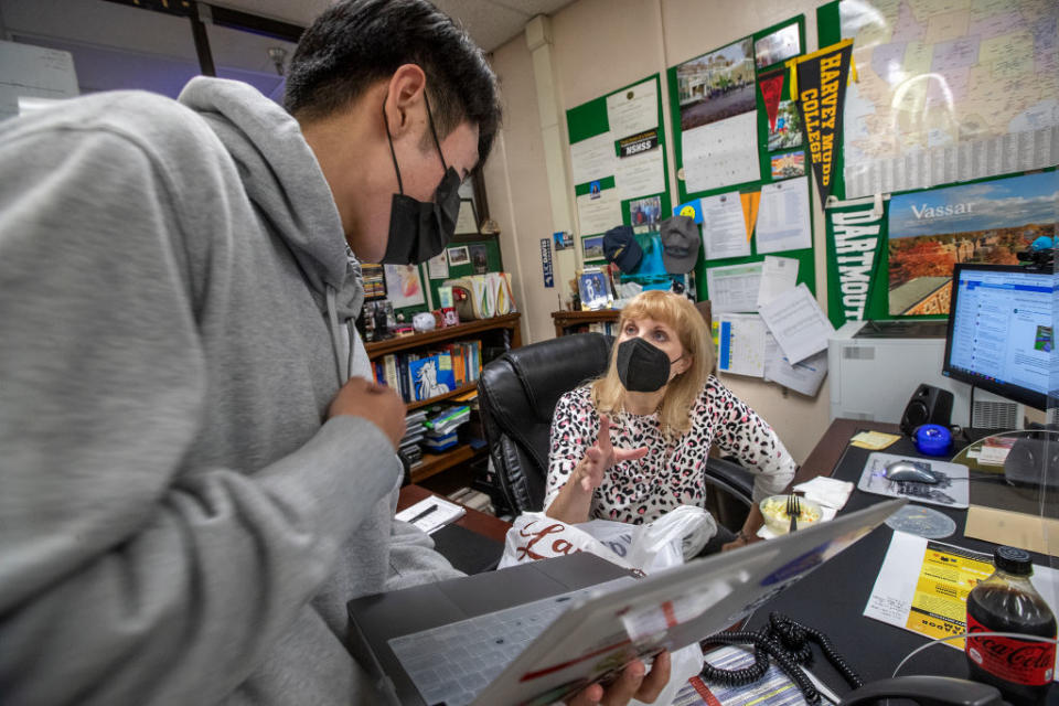 Joey Lim, 18, a senior in Los Angeles talks with his college counselor.(Mel Melcon / Getty Images)