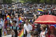 People march in the Pride parade, Saturday, June 10, 2023, in Boston. The biggest Pride parade in New England returned on Saturday after a three-year hiatus, with a fresh focus on social justice and inclusion rather than corporate backing. (AP Photo/Michael Dwyer)