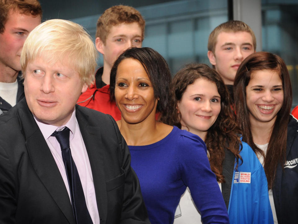 London Mayor Boris Johnson (left)  meets Olympic hopefuls, along with Dame Kelly Holmes (second left), where he announced that 30 young athletes would receive grants of 1,000 each to help them reach their potential by the 2012 Olympics. 