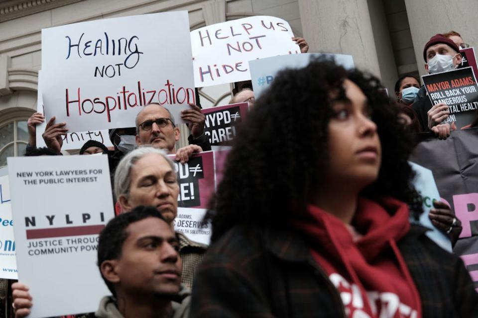 Opponents of New York Mayor Eric Adams’ plans for involuntary treatment participate in a rally at City Hall. <a href="https://www.gettyimages.com/detail/news-photo/opponents-of-new-york-mayor-eric-adams-plan-to-news-photo/1447764898?phrase=homeless%20new%20york&adppopup=true" rel="nofollow noopener" target="_blank" data-ylk="slk:Spencer Platt/Getty Images;elm:context_link;itc:0;sec:content-canvas" class="link ">Spencer Platt/Getty Images</a>