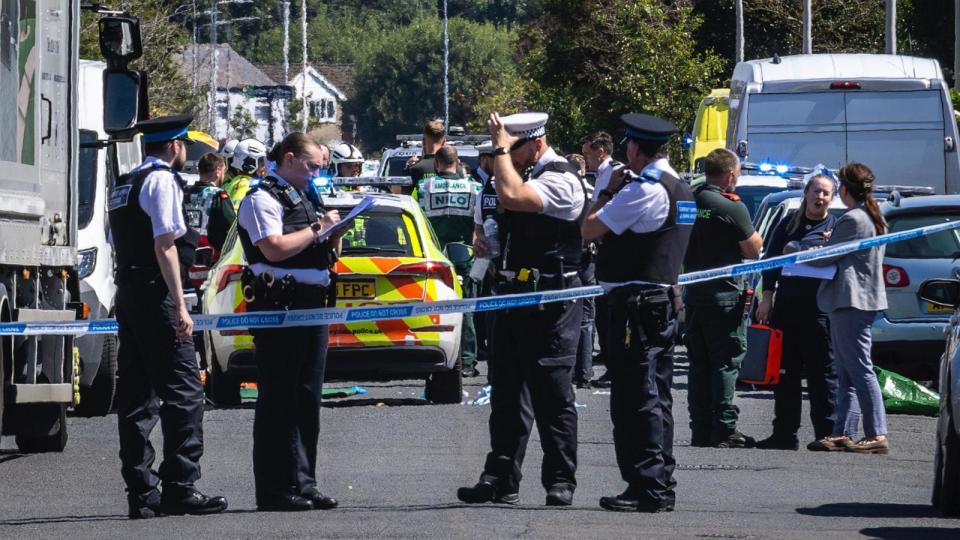 PHOTO: Police secure the area, where a man has been detained and a knife has been seized after a number of people were injured in a reported stabbing, in Southport, Merseyside, England, Monday July 29, 2024. (James Speakman/AP)
