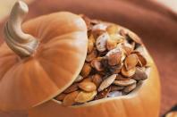 <p>Use your <a href="https://www.countryliving.com/diy-crafts/g279/pumpkin-carving-ideas/" rel="nofollow noopener" target="_blank" data-ylk="slk:pumpkin carving;elm:context_link;itc:0;sec:content-canvas" class="link ">pumpkin carving</a> discards to make a sweet or savory snack for the family. Try <a href="https://www.countryliving.com/food-drinks/g3734/what-to-do-with-pumpkin-seeds/" rel="nofollow noopener" target="_blank" data-ylk="slk:pumpkin seeds;elm:context_link;itc:0;sec:content-canvas" class="link ">pumpkin seeds</a> on salads or mixed into brittle, too.</p>