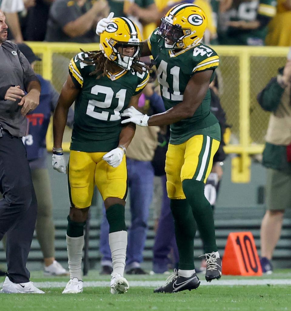 Eric Stokes, left, quickly became a key member of the Packers' secondary in his rookie season.