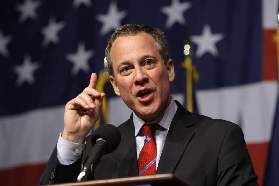 FILE - In this Nov. 3, 2010 file photo, New York Attorney General-elect Eric Schneiderman gestures while giving his victory speech just past midnight in New York. The New York attorney general's office has hit JPMorgan Chase & Co. with a civil lawsuit, alleging that investment bank Bear Stearns — prior to its collapse and subsequent sale to JPMorgan in 2008 — perpetrated massive fraud in deals involving billions in residential mortgage-backed securities. (AP Photo/Frank Franklin II, File)