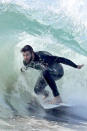 <p>The surfing fan hit the waves Sunday morning with a few pals in Malibu, Calif. Miley’s man has major ocean skills, and looked like a total pro. (Photo: BACKGRID) </p>