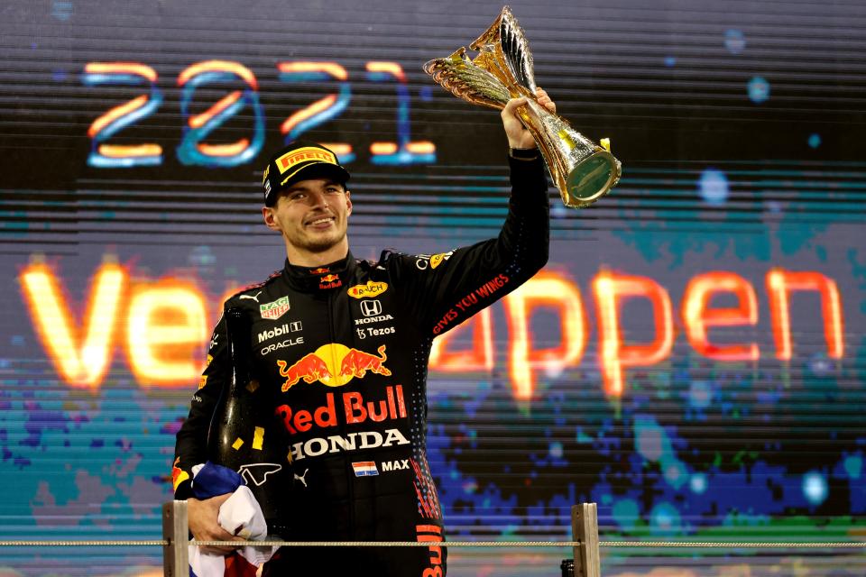 Max Verstappen, pictured here with the trophy after winning the F1 world title in 2021.