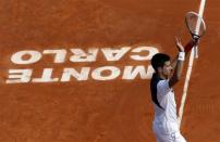 Novak Djokovic of Serbia celebrates after defeating Albert Montanes of Spain during the Monte Carlo Masters in Monaco April 15, 2014. REUTERS/Eric Gaillard