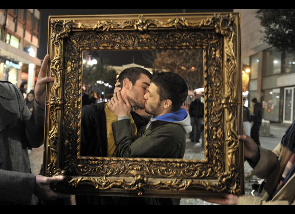 A gay couple kisses on Feb. 14, 2011 during a protest against the Greek state's refusal to recognise same-sex marriages on Athens' Ermou St, the capital's main shopping thoroughfare.