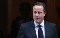 Britain's Prime Minister David Cameron leaves 10 Downing Street in London, Britain November 26, 2015 REUTERS/Suzanne Plunkett