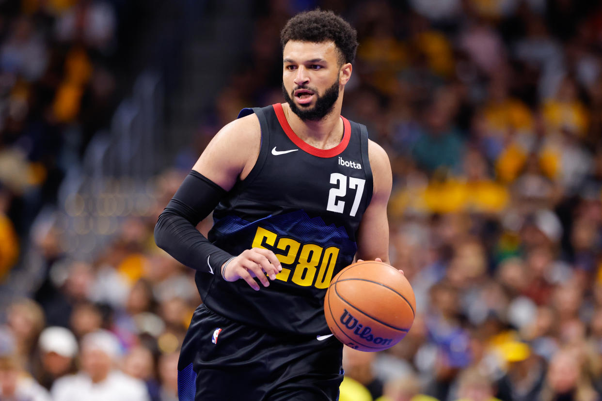 DENVER, COLORADO - NOVEMBER 3: Jamal Murray #27 of the Denver Nuggets handles the ball against the Dallas Mavericks during the NBA In-Season Tournament at Ball Arena on November 3, 2023 in Denver, Colorado. NOTE TO USER: User expressly acknowledges and agrees that, by downloading and or using this photograph, User is consenting to the terms and conditions of the Getty Images License Agreement. (Photo by C. Morgan Engel/Getty Images)