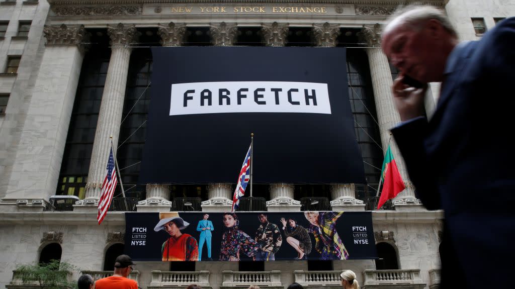A banner to celebrate the IPO of online fashion house Farfetch is displayed on the facade of the of the New York Stock Exchange (NYSE) in New York, U.S., September 21, 2018.