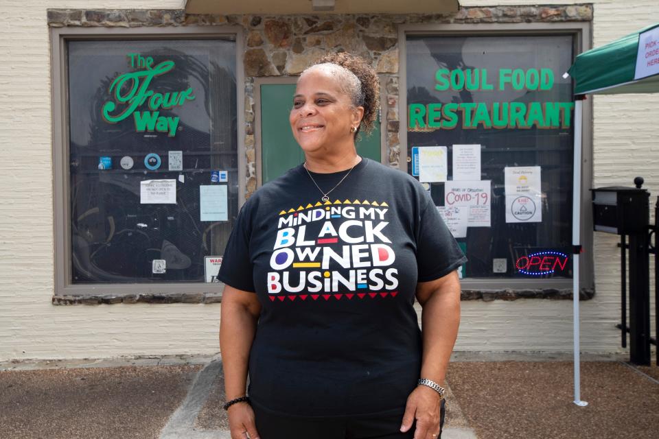 Owner Patrice Bates Thompson stands outside The Four Way in Soulsville. The Memphis restaurant is a soul food institution.