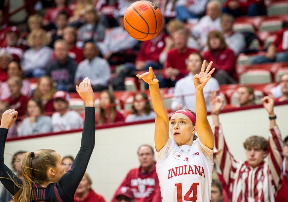 Indiana's Sara Scalia (14) makes a three-pointer during the first half of the Indiana versus Minnesota women's basketball game at Simon Skjodt Assembly Hall on Wednesday, Jan. 17, 2024.