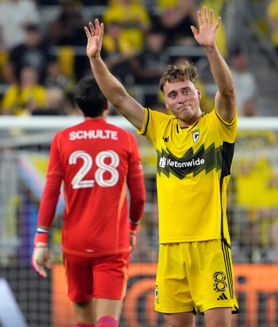 Jun 22, 2024; Columbus, OH, USA; Columbus Crew midfielder Aidan Morris (8) waves to the fans as he gets subbed out against Sporting KC during the second half of their MLS game at Lower.com Field.