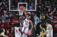 Rutgers forward Ron Harper Jr. (24) dunks against Iowa during the first half of an NCAA college basketball game Wednesday, Jan. 19, 2022, in Piscataway, N.J. (Andrew Mills/NJ Advance Media via AP)