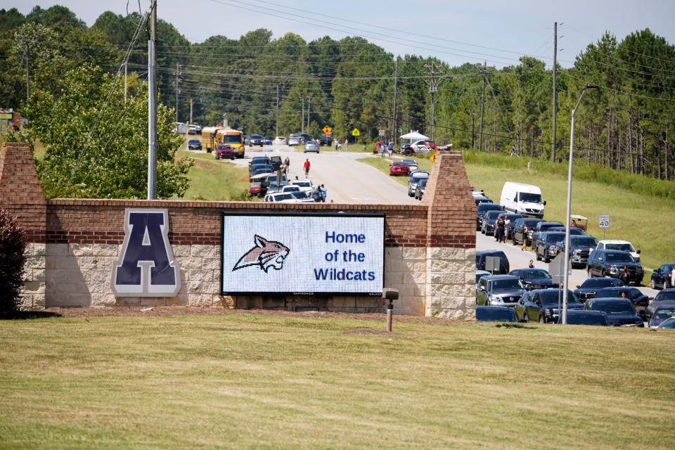 WINDER, GEORGIA - SEPTEMBER 4: Cars line the street as parents arrive to pick up their students following a shooting at Apalachee High School on September 4, 2024 in Winder, Georgia. Multiple deaths and injuries were reported and a suspect is in custody, according to authorities. (Photo by Megan Varner/Getty Images)