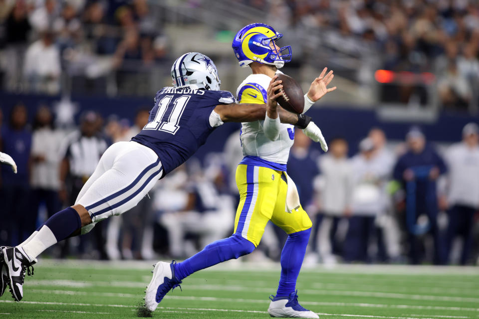 Oct 29, 2023; Arlington, Texas, USA; Dallas Cowboys linebacker Micah Parsons (11) attempts to sack Los Angeles Rams quarterback <a class="link " href="https://sports.yahoo.com/nfl/players/9265" data-i13n="sec:content-canvas;subsec:anchor_text;elm:context_link" data-ylk="slk:Matthew Stafford;sec:content-canvas;subsec:anchor_text;elm:context_link;itc:0">Matthew Stafford</a> (9) in the second quarter at AT&T Stadium. Mandatory Credit: Tim Heitman-USA TODAY Sports