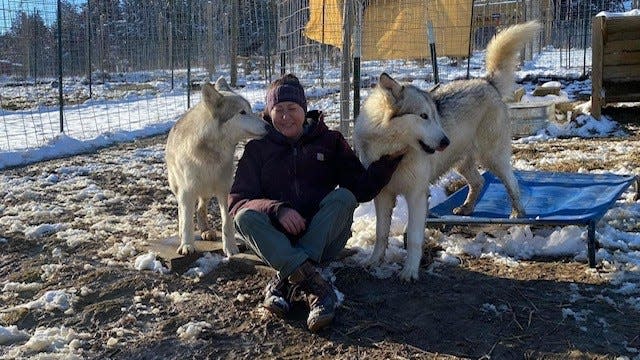 Alicia Bigos, of Warwick, has flown out to Ohio to volunteer with the Red Riding Hood Rescue Project. Here she is with Jackson and Tilly.