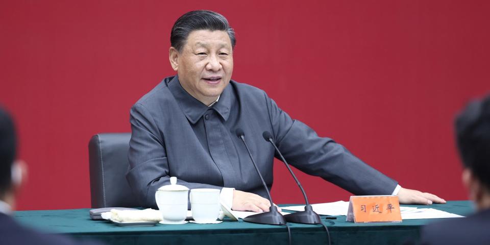 Chinese President Xi Jinping sits down during a visit to Renmin University of China in Beijing, capital of China, April 25, 2022.