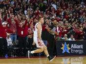 Wisconsin's Brad Davison (34) reacts after hitting the game-winning 3-point basket against Maryland in the final seconds of an NCAA college basketball game Tuesday, Jan. 14, 2020, in Madison, Wis. Wisconsin upset Maryland 56-54. (AP Photo/Andy Manis)