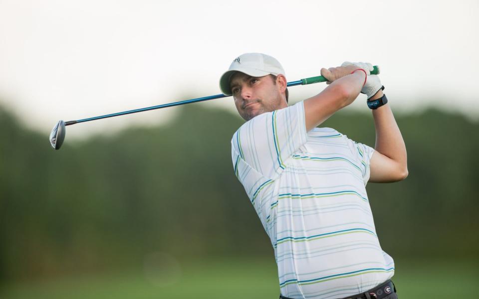 Jay McLuen of the United States plays a tee shot at the sixth hole during the third round of the 2013 OHL Classic at Mayakob - Getty Images