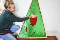 <p>We've all seen those oh-so-trendy mermaid sequins on throw pillows and notebooks, but have you ever seen them on a Christmas tree? Using red and green mermaid sequin fabric and plywood, this sparkling tree is brought to life. </p><p><strong>Get the tutorial at <a href="https://atcharlotteshouse.com/mermaid-sequin-christmas-tree/" rel="nofollow noopener" target="_blank" data-ylk="slk:At Charlotte’s House;elm:context_link;itc:0;sec:content-canvas" class="link ">At Charlotte’s House</a>.</strong></p><p><a class="link " href="https://www.amazon.com/gp/product/B077ZHZHZ2/?tag=syn-yahoo-20&ascsubtag=%5Bartid%7C10050.g.28872053%5Bsrc%7Cyahoo-us" rel="nofollow noopener" target="_blank" data-ylk="slk:SHOP MERMAID SEQUIN FABRIC;elm:context_link;itc:0;sec:content-canvas">SHOP MERMAID SEQUIN FABRIC</a></p>