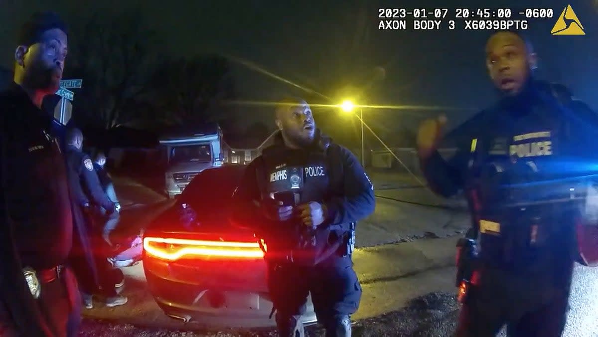 Officers from Memphis’ Scorpion unit stand around discussing the brutal beating of Tyre Nichols. (Memphis Police Department)