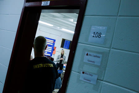 Former Sandy Hook teacher Kaitlin Roig speaks to teachers and staff members about her experience during the Sandy Hook shooting, at an active shooter training at James I. O'Neill High School in Highland Falls, New York, U.S., December 12, 2017. REUTERS/Eduardo Munoz