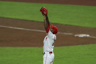 Cincinnati Reds' Raisel Iglesias reacts to the final out in the team's baseball game against the Cleveland Indians in Cincinnati, Monday, Aug. 3, 2020. The Reds won 3-2. (AP Photo/Aaron Doster)