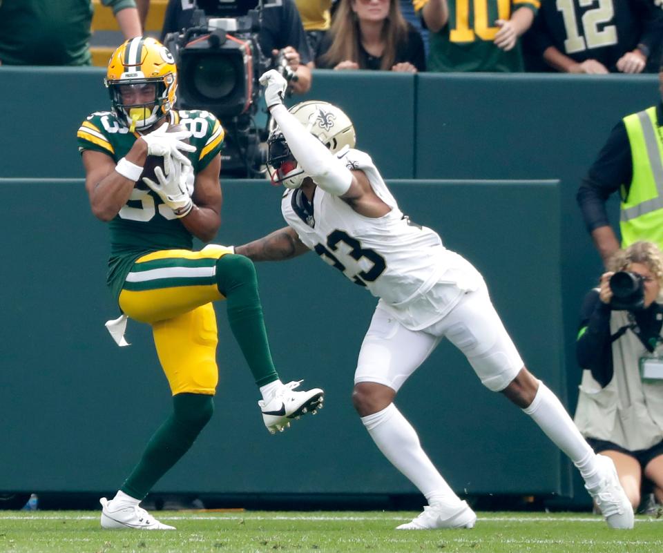 Green Bay Packers wide receiver Samori Toure (83) catches a pass to for a 2 point conversion giving the Packers a fourth quarter lead over the New Orleans Saints during their football game Sunday, September 24, 2023, at Lambeau Field in Green Bay, Wis. The Packers defeated the Saints 18-17.
