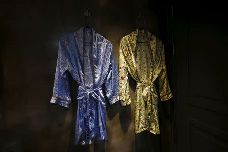 Bathrobes hang on the wall of an empty room at a branch of Hotel Yaja in Seoul, South Korea, July 21, 2015. REUTERS/Kim Hong-Ji