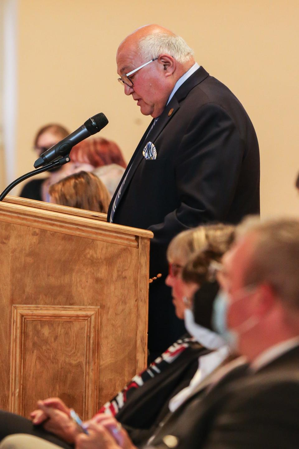 Framingham Mayor Charlie Sisitsky reads a statement during the state Department of Public Health public hearing at Nevins Hall in Framingham, July 6, 2022.