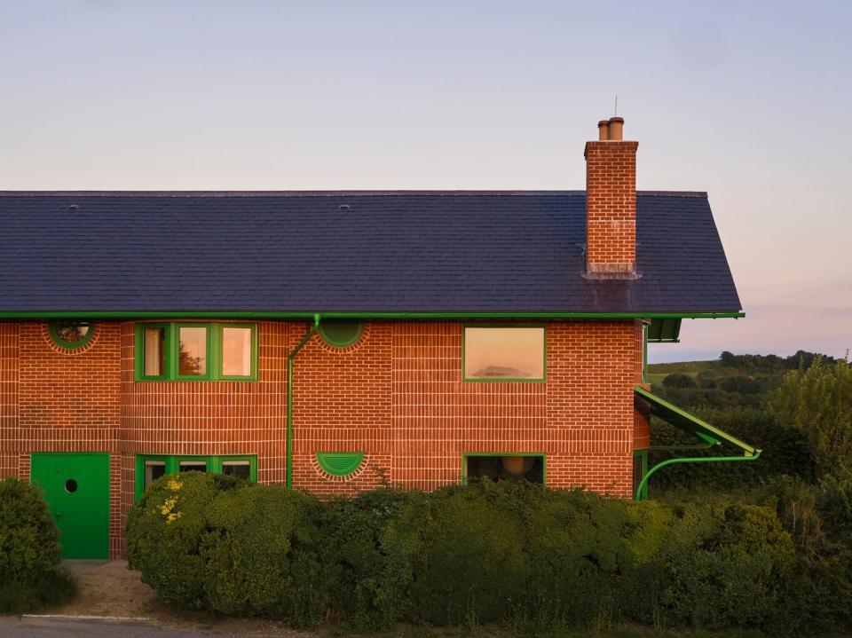 <p><strong>SHORTLISTED</strong></p><p>• Dorset</p><p>With a playful take on the rural farmhouse, The Red House has an eccentric appearance thanks to its bold green eaves, doors and windows. Inside you'll find an informal but connected series of spaces, unified throughout by beautiful end-grain, larch wood-block parquet flooring.</p>
