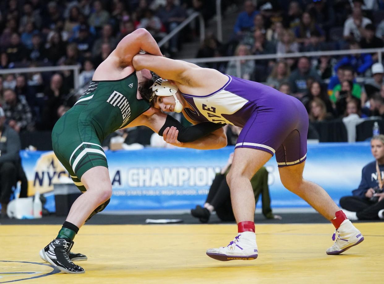 Minisink Valley's Zach Ryder wrestles Hilton's Elijah Diakomihalis in theDivision 1 189-pound championship match at the NYSPHSAA Wrestling Championships at MVP Arena in Albany, on Saturday, February 25, 2023.