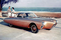 <p>With much of the rest of the industrialised world focusing on rebuilding cities destroyed during the war, nobody could keep up with the Americans in the 1950s, with one futuristic concept appearing after another. The Golden Rocket packed a <strong>275bhp </strong>punch from its <strong>3.2-litre </strong>V8, and it introduced us to <strong>powered steering column</strong> adjustment.</p><p>Its party piece though was the <strong>seats rose up</strong> and <strong>swivelled outwards</strong> when the doors were opened. All these features made it into production cars shortly afterwards. One feature that did not were the <strong>roof panels</strong> that hinged upwards so it was easier to get in and out.</p>
