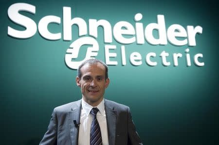 Jean-Pascal Tricoire, CEO of French engineering group Schneider Electric, poses for the media before the company's shareholder's meeting in La Defense, near Paris, April 23, 2009. REUTERS/Gonzalo Fuentes