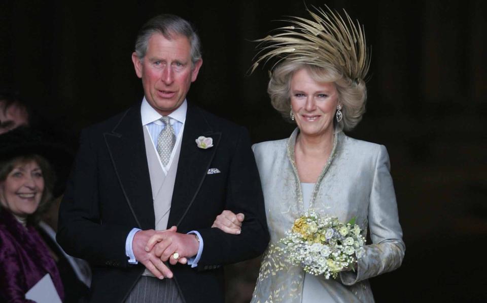 King Charles and Camilla leave St George's Chapel in Windsor following the church blessing of their civil wedding ceremony in 2005 - Reuters