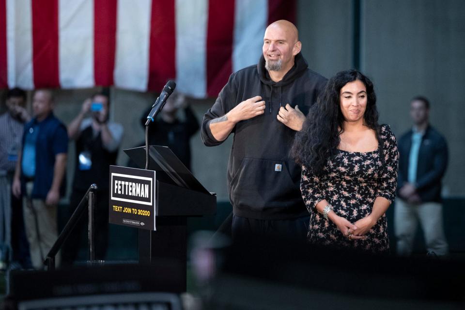 Pennsylvania Lt. Gov. and Democratic Senate nominee John Fetterman and his wife, Gisele, at Riverfront Sports in Scranton, Pa., on Sept. 17, 2022.