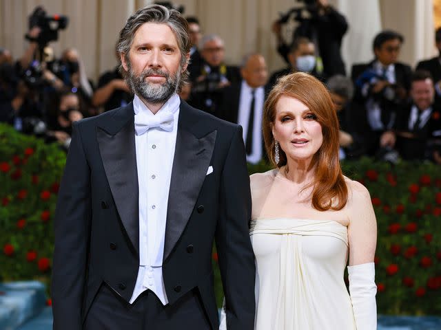<p>Theo Wargo/WireImage</p> Bart Freundlich and Julianne Moore attend The 2022 Met Gala Celebrating "In America: An Anthology of Fashion" on May 02, 2022 in New York City.