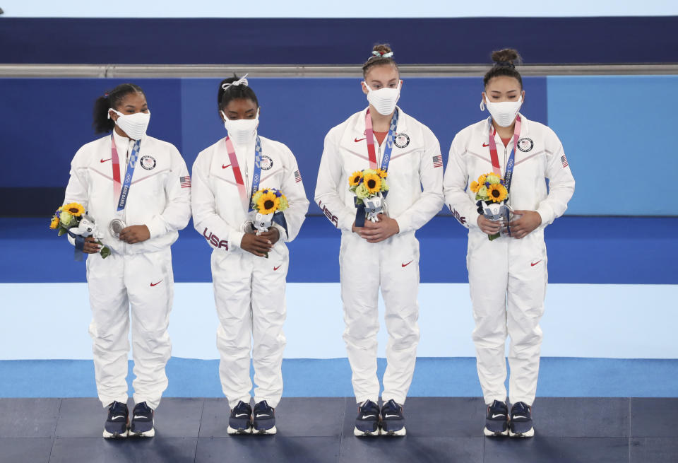 Pictured here, Team USA with their silver medals in the artistic Women's Team Final.