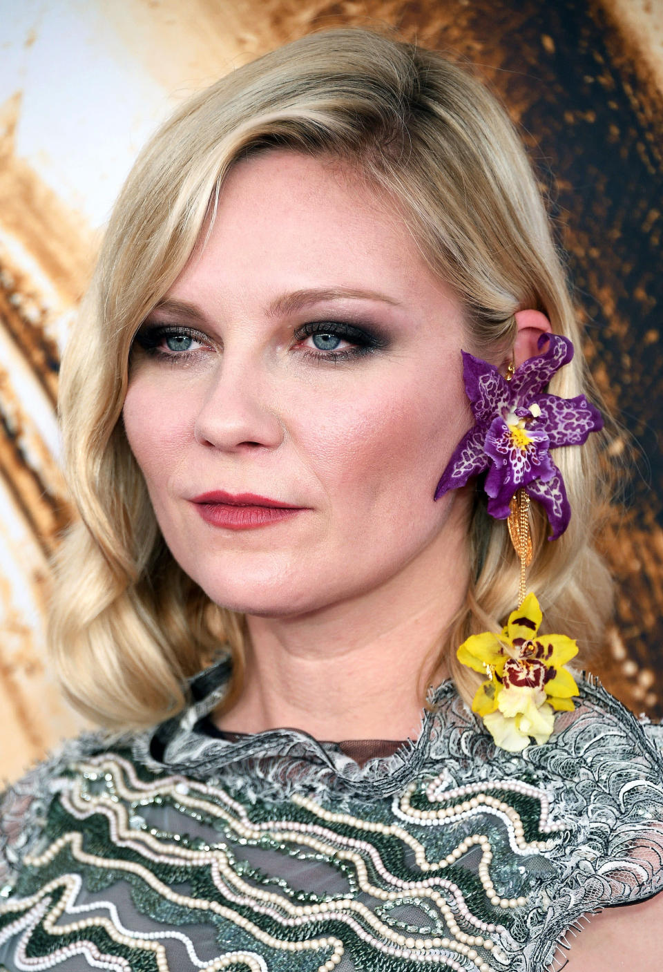 Kirsten Dunst wore actual orchids as her earrings at the CFDA Fashion Awards 2016 on June 6 in NYC — see her floral-inspired red carpet style