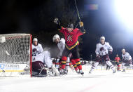 <p>STATELINE, NEVADA - FEBRUARY 20: Jonathan Marchessault #81 of the Vegas Golden Knights celebrates a goal by teammate Alec Martinez #23 in front of goaltender Philipp Grubauer #31 and Devon Toews #7 of the Colorado Avalanche during the second period of the 2021 Bridgestone NHL Outdoors Saturday game on the 18th fairway of the Edgewood Tahoe Resort, at the south shore of Lake Tahoe on February 20, 2021 in Stateline, Nevada. (Photo by Brian Babineau/NHLI via Getty Images)</p> 