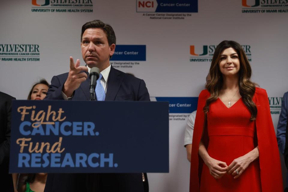 Florida Gov Ron DeSantis speaks during during a press conference at the University of Miami Health System Don Soffer Clinical Research Center on 17 May 2022 in Miami, Florida alongside his wife, Casey DeSantis, who recently survived breast cancer (Getty Images)