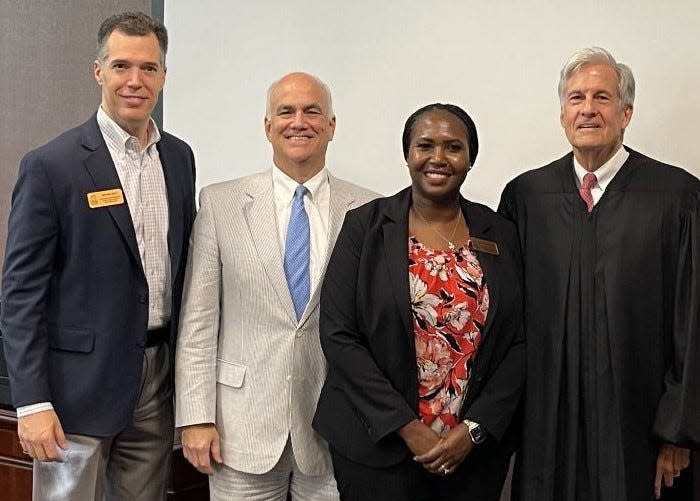 Athens Technical College's three new board members, from left, Mike Sale, Phil Bettendorf and Cheveda McCamy were sworn in recently by Judge Lawton Stephens.