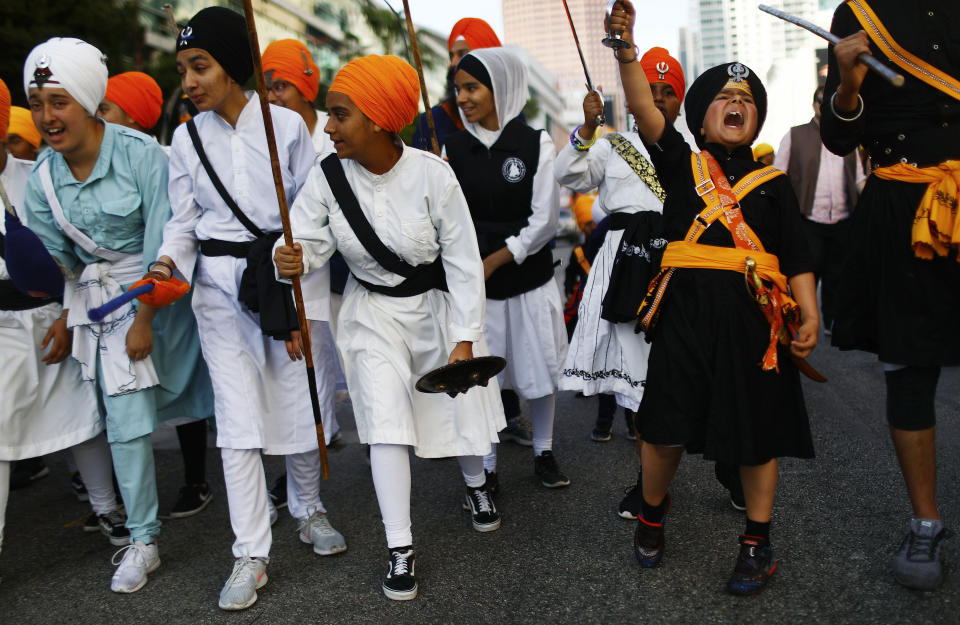 Young Sikhs practice traditional Indian martial arts during an annual parade marking Vaisakhi on April 14, 2019, in Los Angeles. (Photo: Mario Tama via Getty Images)